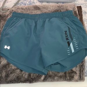 Under armor running shorts, dark green color